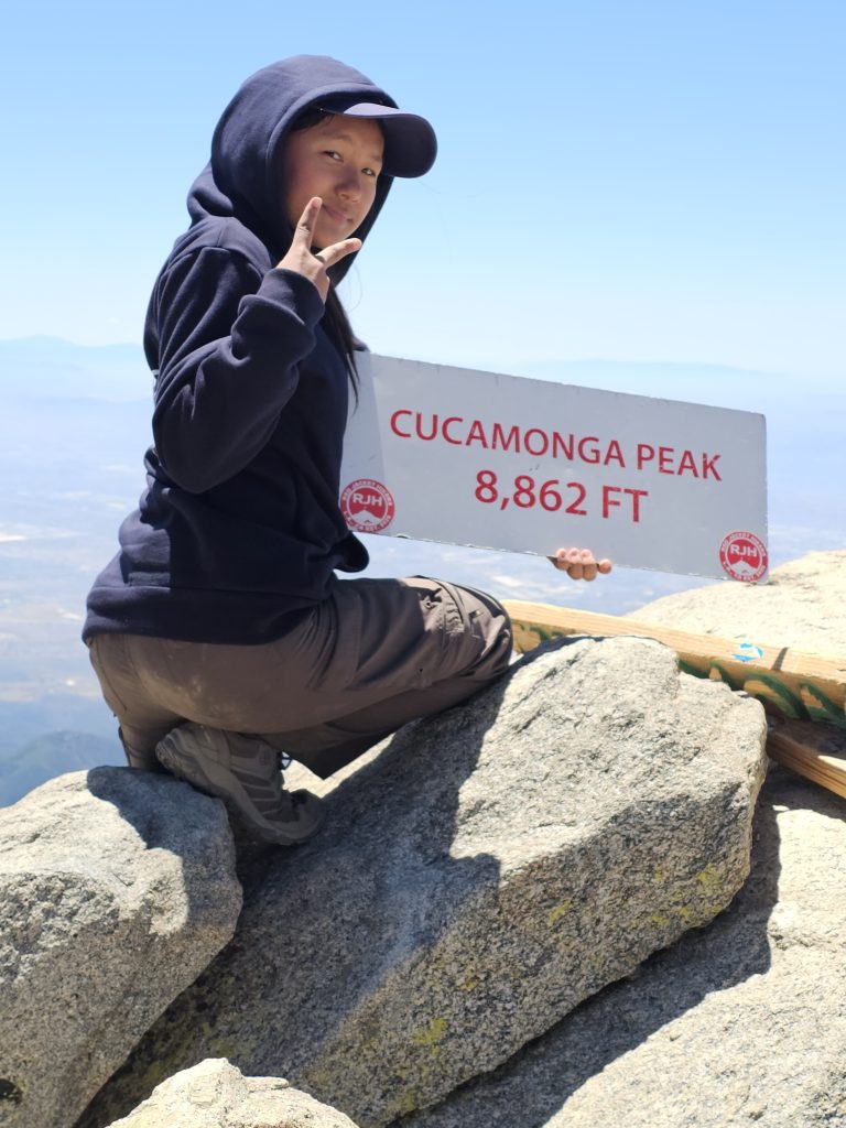 Standing tall at 8,862 feet on Cucamonga Peak. An incredible, unforgettable accomplishment!